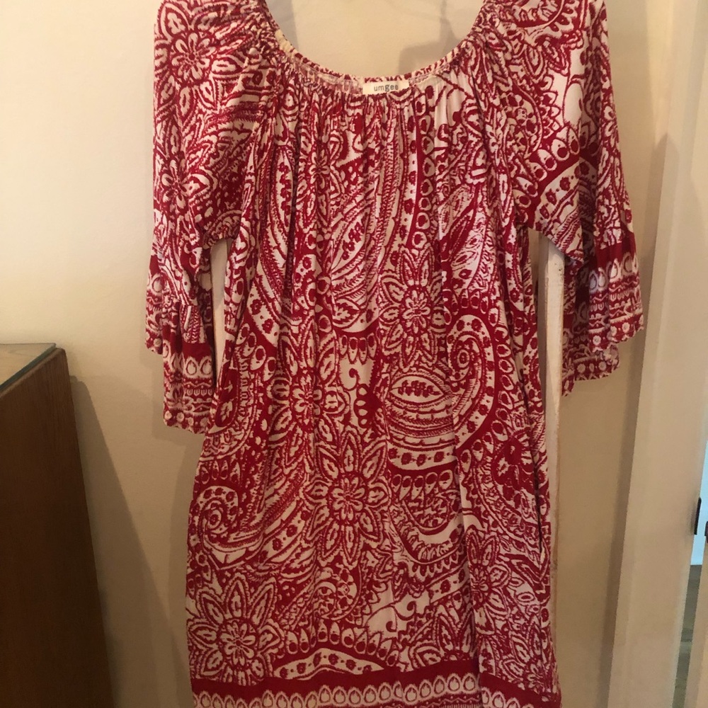 Festive bell-sleeved tunic or minidress.